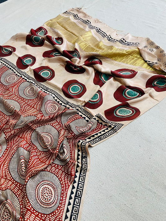 Ivory Modal Gajji silk saree with maroon and teal circular motifs, rust-red printed pallu, black geometric border and mustard-gold section