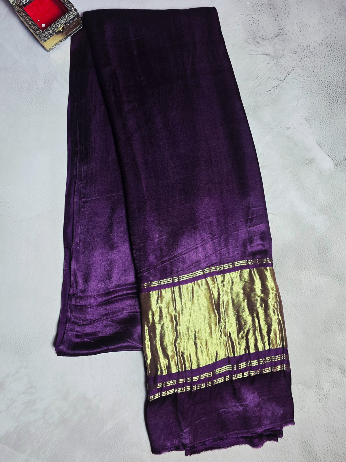 Deep emerald green Modal Silk plain saree with antique gold zari pallu