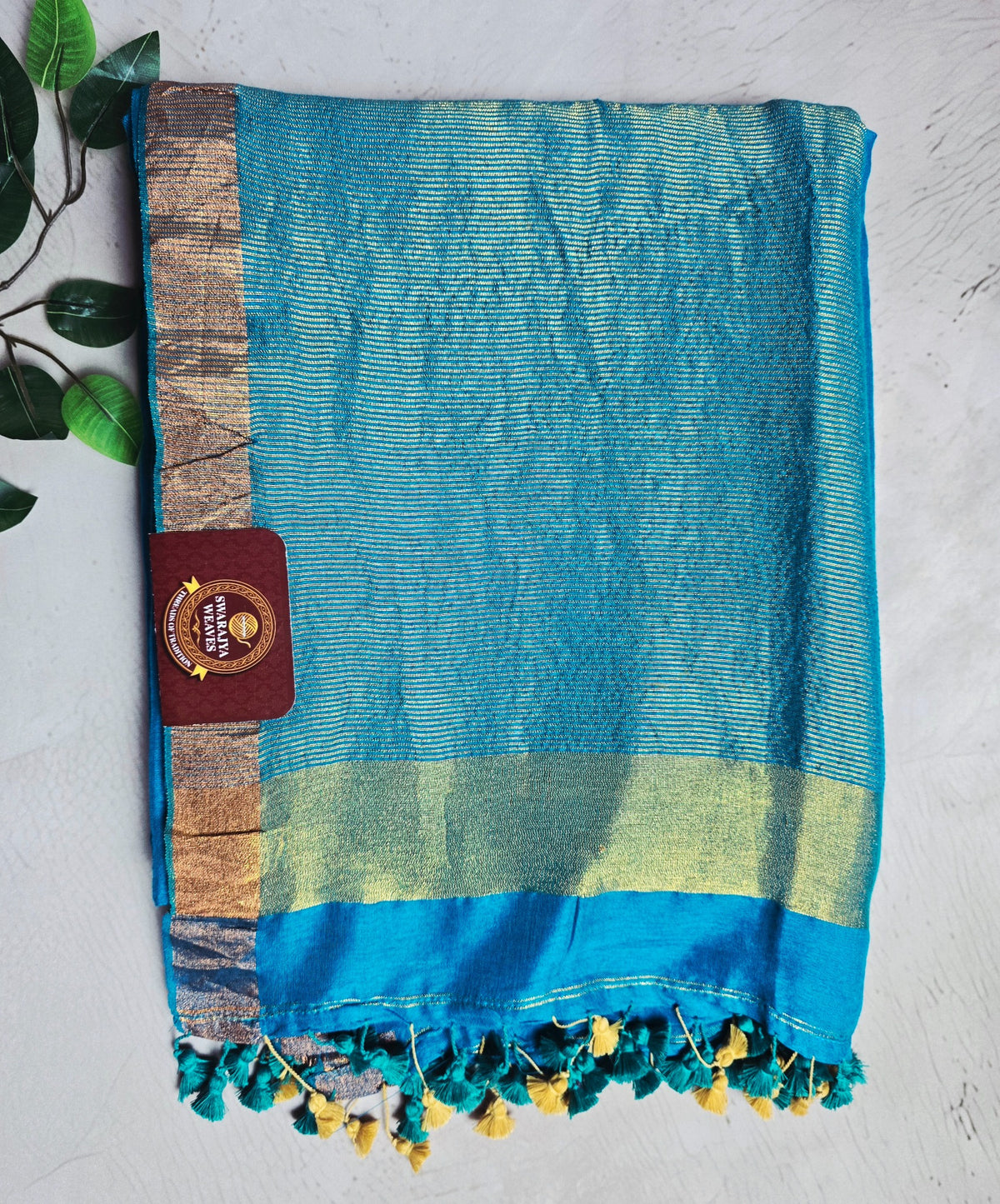 Bright turquoise blue Mul Cotton saree with pale gold zari border