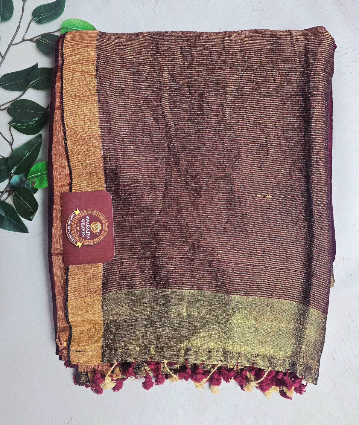 Deep wine Mul Cotton saree with antique gold zari stripes and tassels