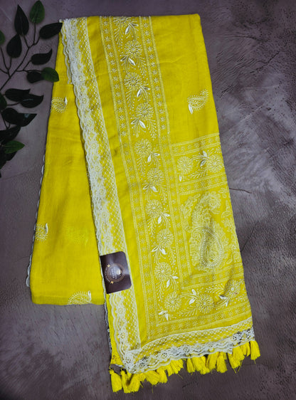 Sunshine yellow Mul Cotton saree with ivory embroidered border and tassels