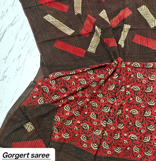 Brown georgette saree with red and ivory geometric motifs and printed pallu