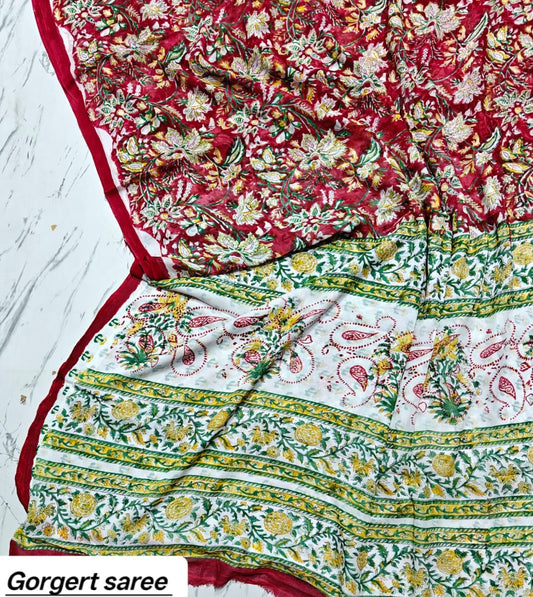 Red georgette saree with multicolour floral motifs and green ivory printed pallu