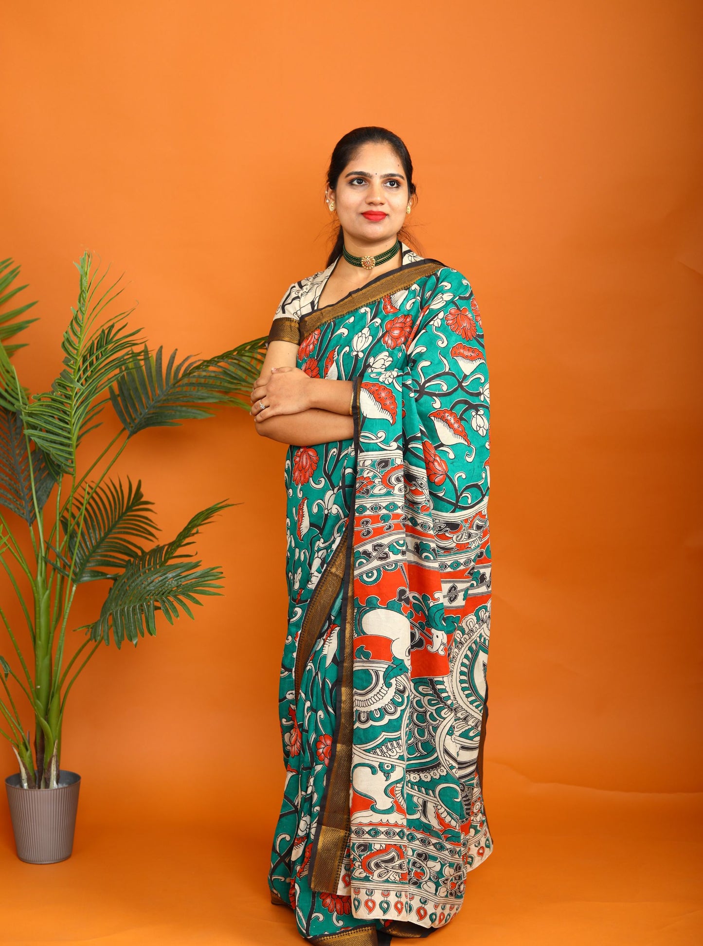 Teal Green Kalamkari Saree with Traditional Floral Print & Contrast Border