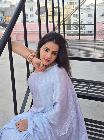Pastel Blue Modal Silk Saree with White Prints – Soft Flow Luxury Drapes