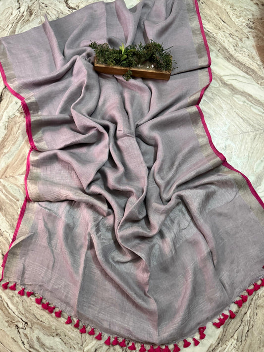 Silver grey linen cotton handloom saree with metallic border, bright pink edging and tassels